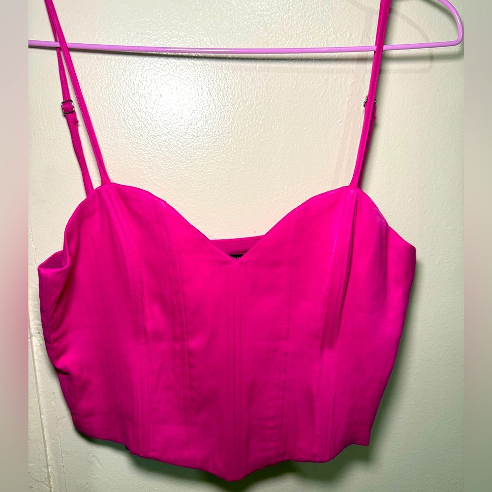 Satin fuchsia pink bustier style top.